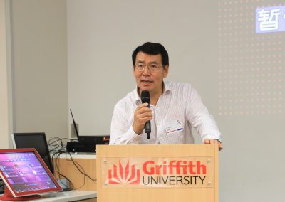 QCASE president, Dr Hua Guo, giving a speech at the Party